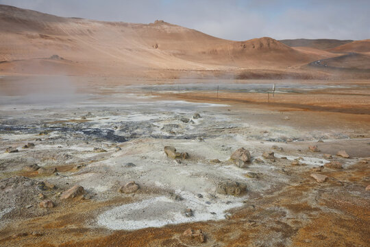 Námaskarð. Fumarole field in Namafjall, Iceland. Namaskard geothermal beauty landscape with mud pools and steam. Icelandic brown landscape. Landscape which pools of boiling mud and hot springs