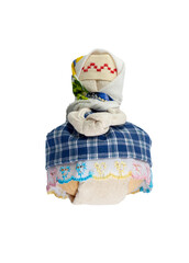 Obraz premium Traditional Russian doll made of fabric. A doll in a blue dress. Home crafts.