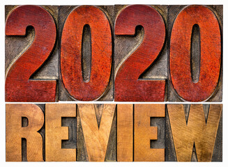 2020 review banner - annual review or summary of the recent year - isolated word abstract in letterpress wood type blocks, business concept