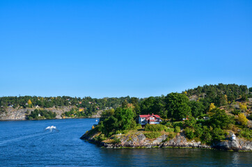 Small rocky islands in the Stockholm archipelago, on the Baltic Sea in the early morning. Swedish landscape