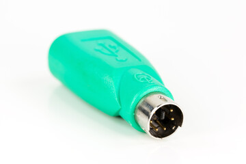 green PS/2 to USB adapter isolated on white background