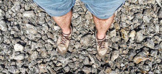 Standing in comfortable hiking shoes on rocks
