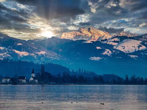 Stunning alpine landscapes along the shores of the Upper Zurich Lake with the iconic Santis peak in the background, Rapperswil-Jona, St. Gallen, Switzerland