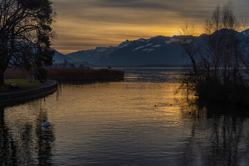 Stunning sunset landscapes along the idyllic shores of the Upper Zurich Lake (Obersee), near Rapperswil, St. Gallen, Switzerland