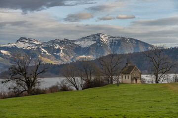 Fototapeta na wymiar XIII c. St. Meinrad Chappel on the shores of Upper Zurich Lake (Obersee) near Bollingen, St. Gallen, Switzerland
