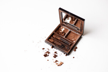 Brown eyeshadow palette, isolated on a white background.