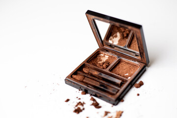 Brown eyeshadow palette, isolated on a white background.