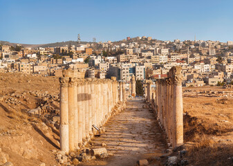 Street South Decumanus in the ancient greco-roman city of Gerasa and the modern city Jerash in the...