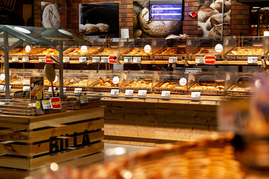 Counters with pastries and breads in the store. Big choice. Moscow, Russia, 01-01-2021.