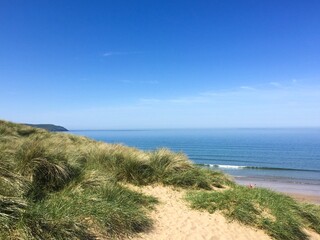 Fototapeta na wymiar A classic summer beach scene at North Devon, England