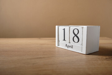 Wooden white small calendar, date 18 April