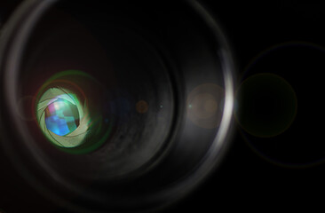 Camera lens with lense reflections.Camera lens detail, front glass of wide angle photography DSLR camera lens, macro shot, selective focus	