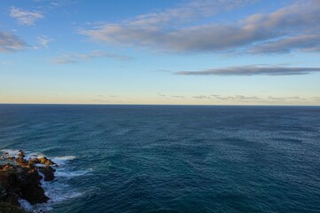 Looking out to sea at sunset at the most easternly point of mainland Australia