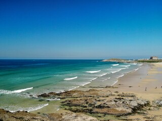 Looking across the famous Fistral Beach on a sunny day