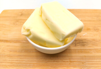 cheese on wooden board, dairy (makkhan) product on wooden 