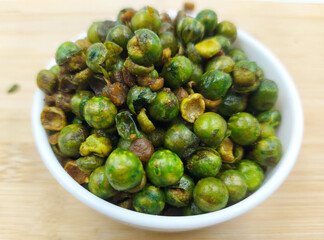 Fried green peas in a bowl