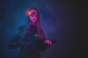 Futuristic woman soldier with a gun concept.