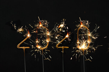 Goodbye 2020 Happy New Year Sparklers decoration dark background