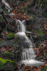 Obraz na płótnie Canvas Waterfall on Bucaci creek in Moravskoslezske Beskydy mountains in winter day