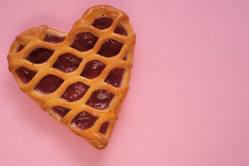 Sweet heart. Valentine's day.Heart shaped cake.Love symbol. Sweet pastry dessert on a pink background