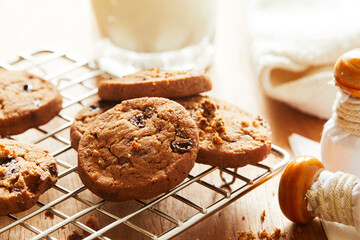 Choco cookies with making products on table.