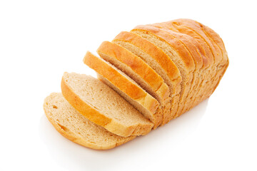 The cut loaf of white bread with reflection on white