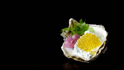 river trout caviar on cheese mousse in an oyster shell
