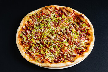 tasty pizza on the black background
