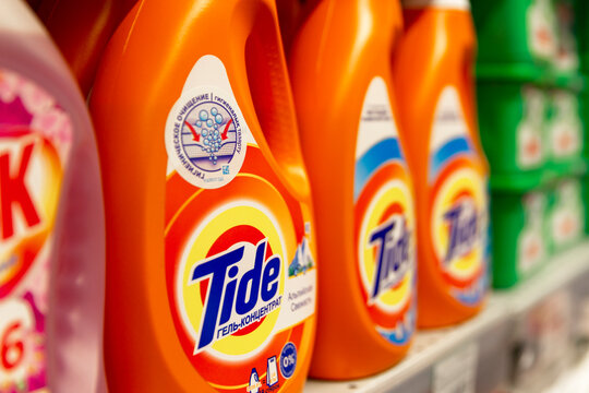 Tide washing powder on the shelf in the store. Close-up. Side view. Moscow, Russia, 01-01-2021.