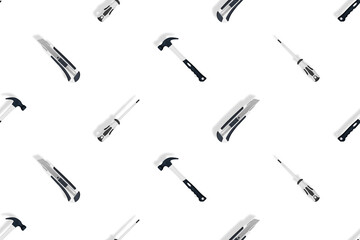 Tools seamless pattern. Tools: hammer, screwdriver and knife on a white background.