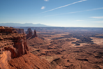 vast desert landscape with canyons and mountains