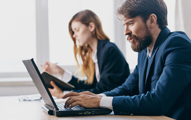 Fototapeta premium Business man and woman working desk technology internet communication finance office