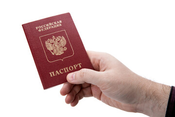 Russian passport in the hand of a man on a white background as identification