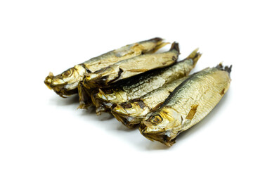 Three smoked sprats isolated on white background