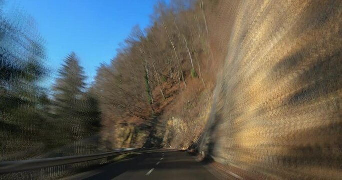 Dashcam Dash Camera POV Driving On Countryside Paved Road In Slovenia. Sped Up Hyper Lapse Footage With Motion Blur Effect. High Altitude Road. Forward Dolly Moving, Wide Angle