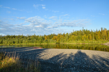 A wild river in deserted forests.