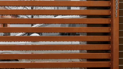 Rain drops on metalic gate