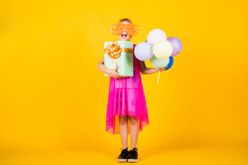 for me. pretty teenage girl hold present box. kid celebrate holiday. cheerful birthday girl. best event ever. happy birthday party. smiling child with party balloons. childhood happiness