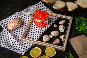 Chum salmon caviar in a glass bowl . Seafood, delicacies, healthy nutrition. 
