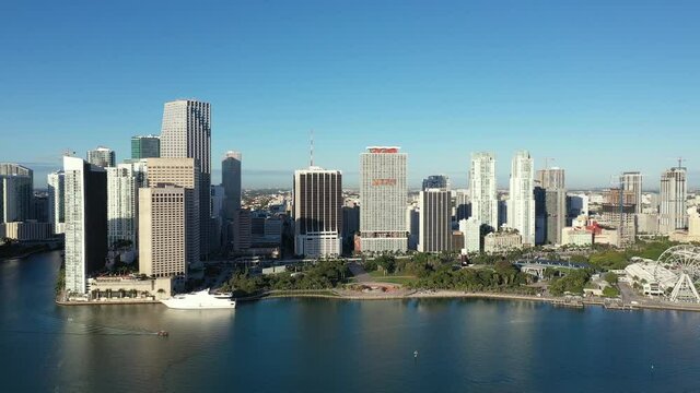 Miami, Florida - 12-27-2020 - Aerial view of City of Miami and Bayfront Park on cloudless winter morning 4k.