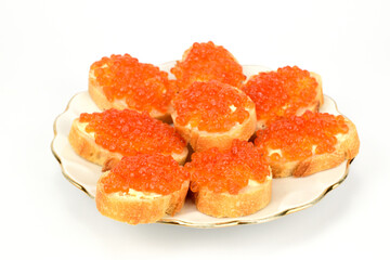 Naklejka na ściany i meble Sandwiches with red caviar laid out on a white plate