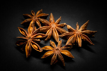 star anise isolated on black background