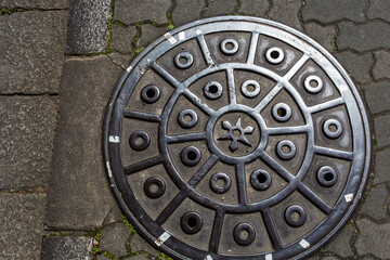 Sewer cover   in Kyoto  next to Katsura river