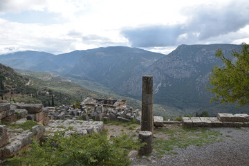 Fototapeta na wymiar View of the main monuments of Greece. Ruins of ancient Delphi. Oracle of Delphi. Mount Parnassus 