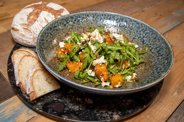 A plate of delicious Maple-Roasted squash and feta cheese