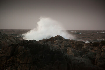 Waves crashing onto a rocky shore