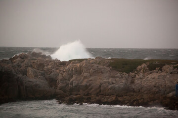 Waves crashing onto a rocky shore