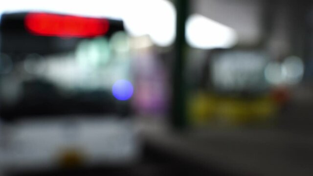 blur of bus stop at parking station