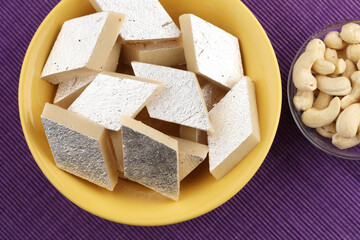 Kaju Katli is an Indian sweet made from khoa and cashew nuts, Kaju katli is a traditional sweet of  India served in festivals and celebrations
