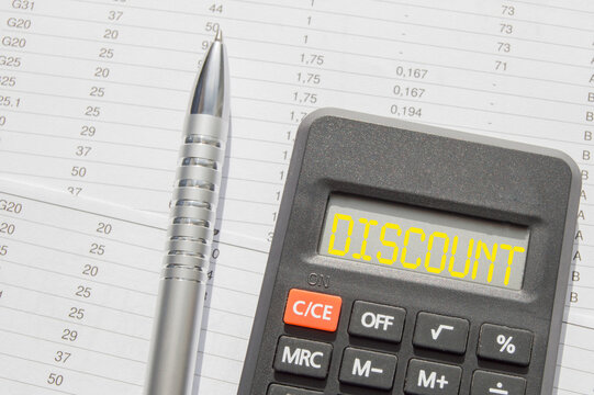 The word tax discount words written on the calculator, pen on the background of accounting reports